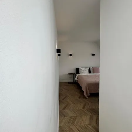 Homes By The C Apartamento