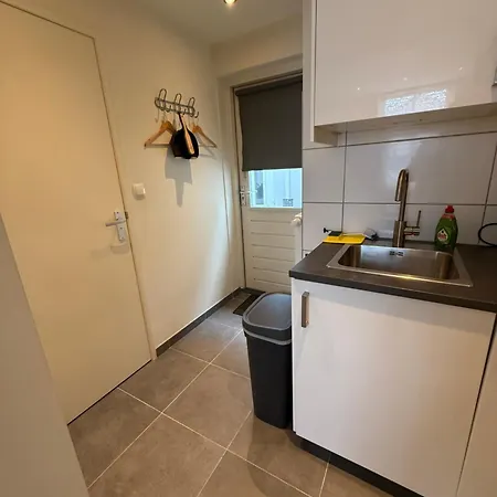 Homes By The C Apartamento